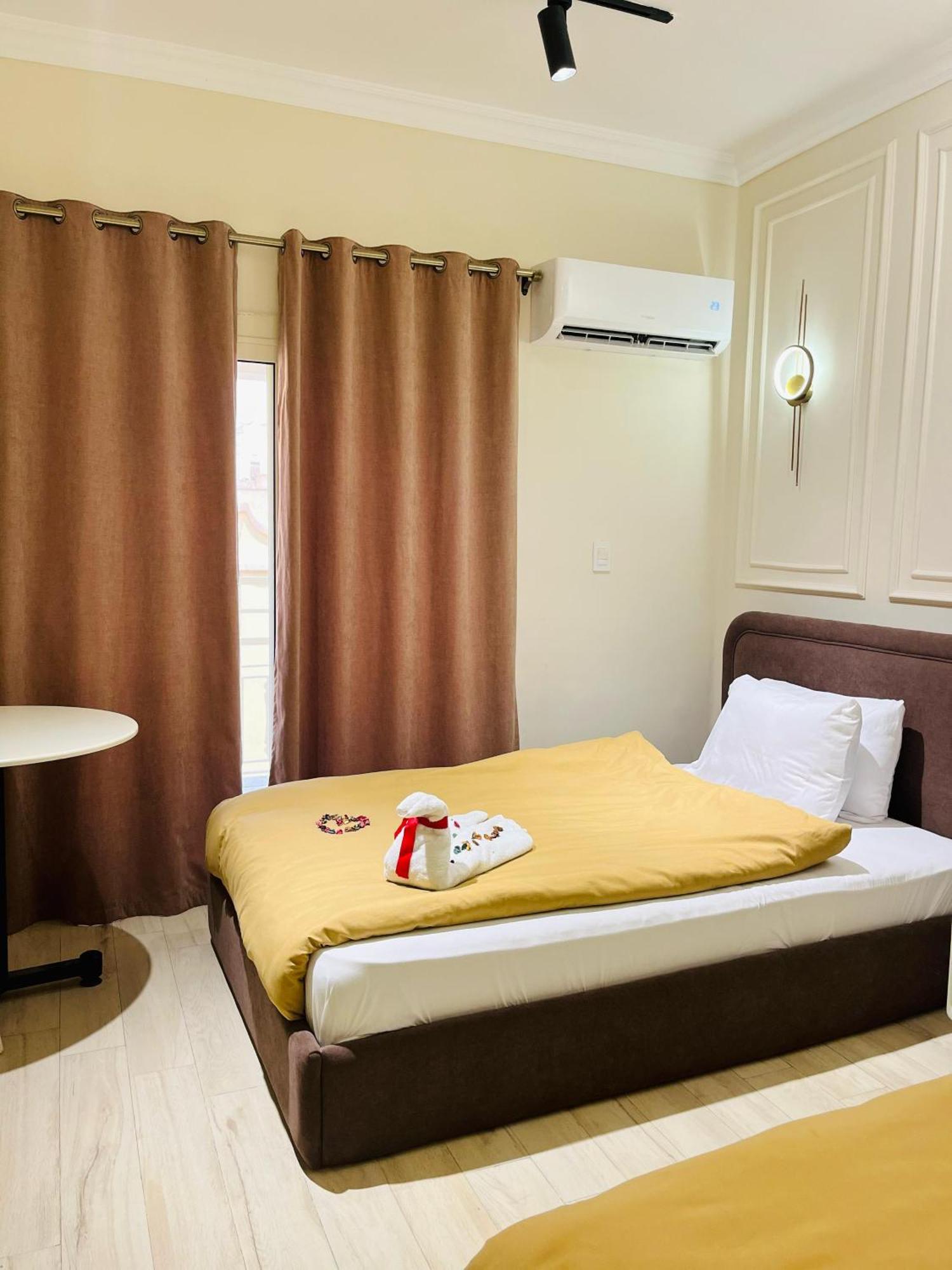 Calma Downtown Hostel *